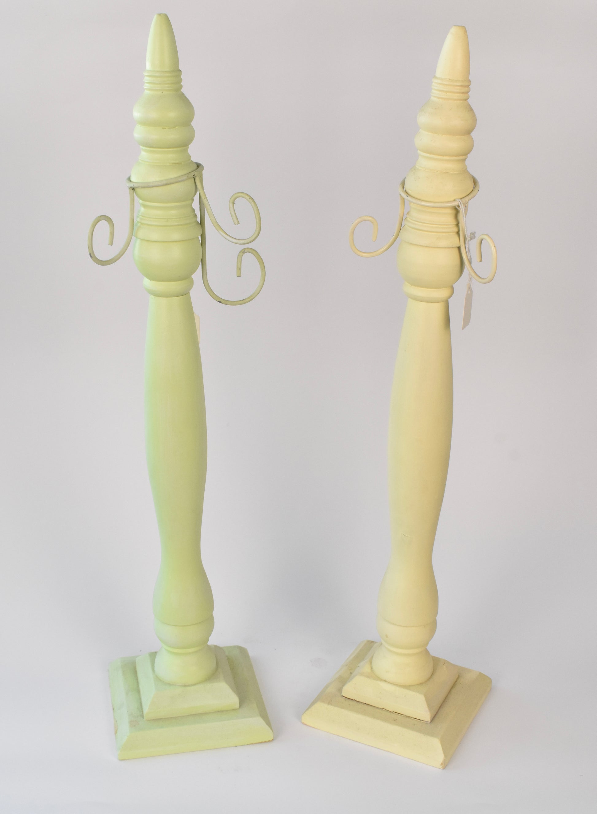 Vintage-Inspired Pale Yellow Taper Holder with Scroll Arms