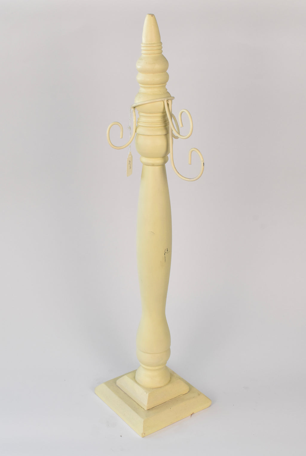 Vintage-Inspired Pale Yellow Taper Holder with Scroll Arms